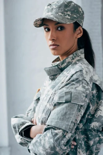 This image features a fierce-looking woman in a military uniform, highlighting the mental toughness required for peak performance.